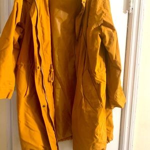 Burnt orange long rain jacket